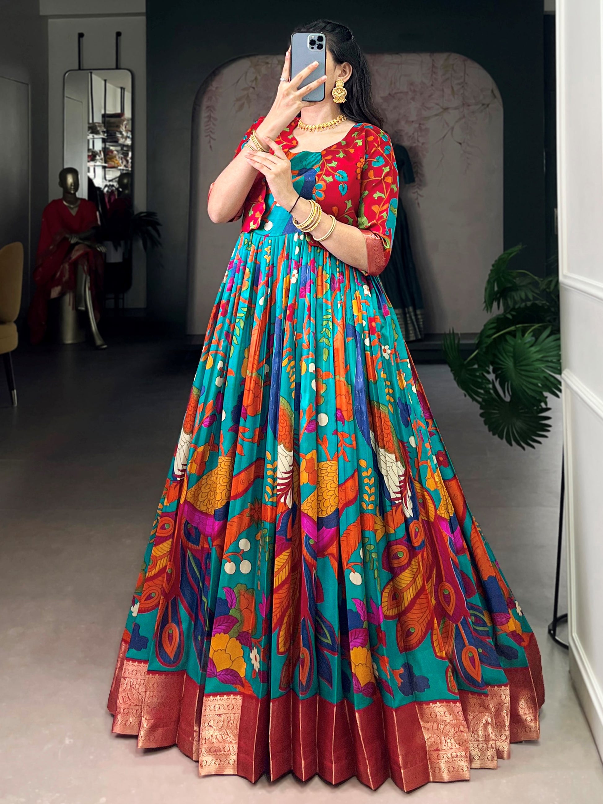 Lovely Teal Blue Kalamkari Print Tussar Silk Festive Wear Gown With Jacket