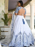 Lovely White Thread Work Sangeet Wear Lehenga Choli With Net Dupatta