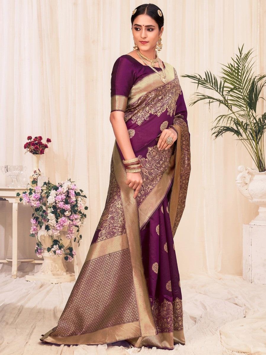 Elegant purple and gold embroidered saree with traditional blouse, perfect for festive occasions.