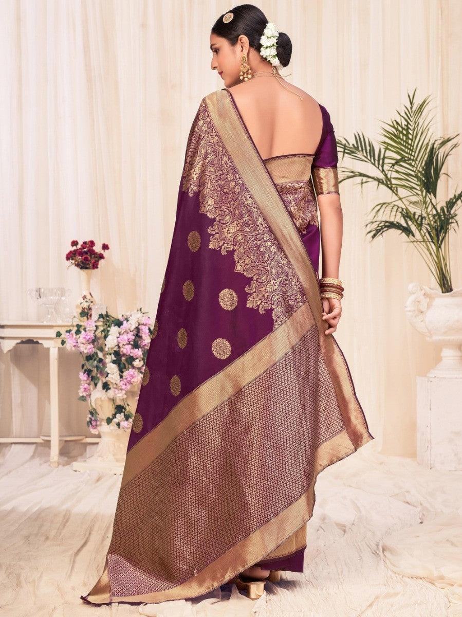 Purple and gold embroidered saree with backless blouse, traditional Indian fashion for women