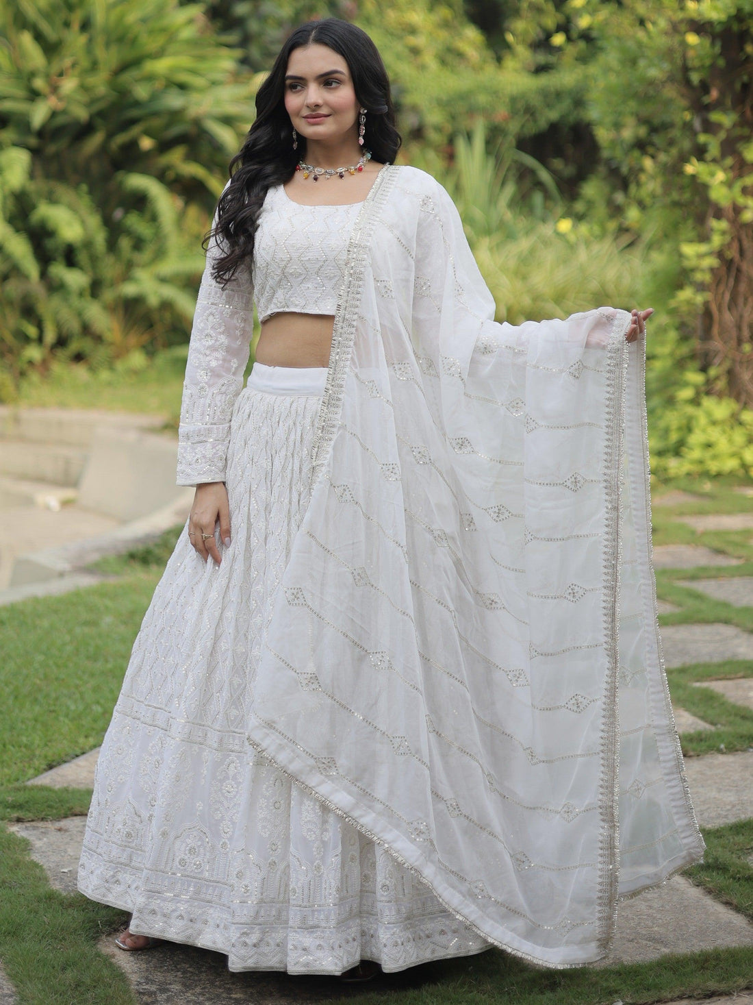 Bewitching White Thread Work Georgette Reception Wear Lehenga Choli
