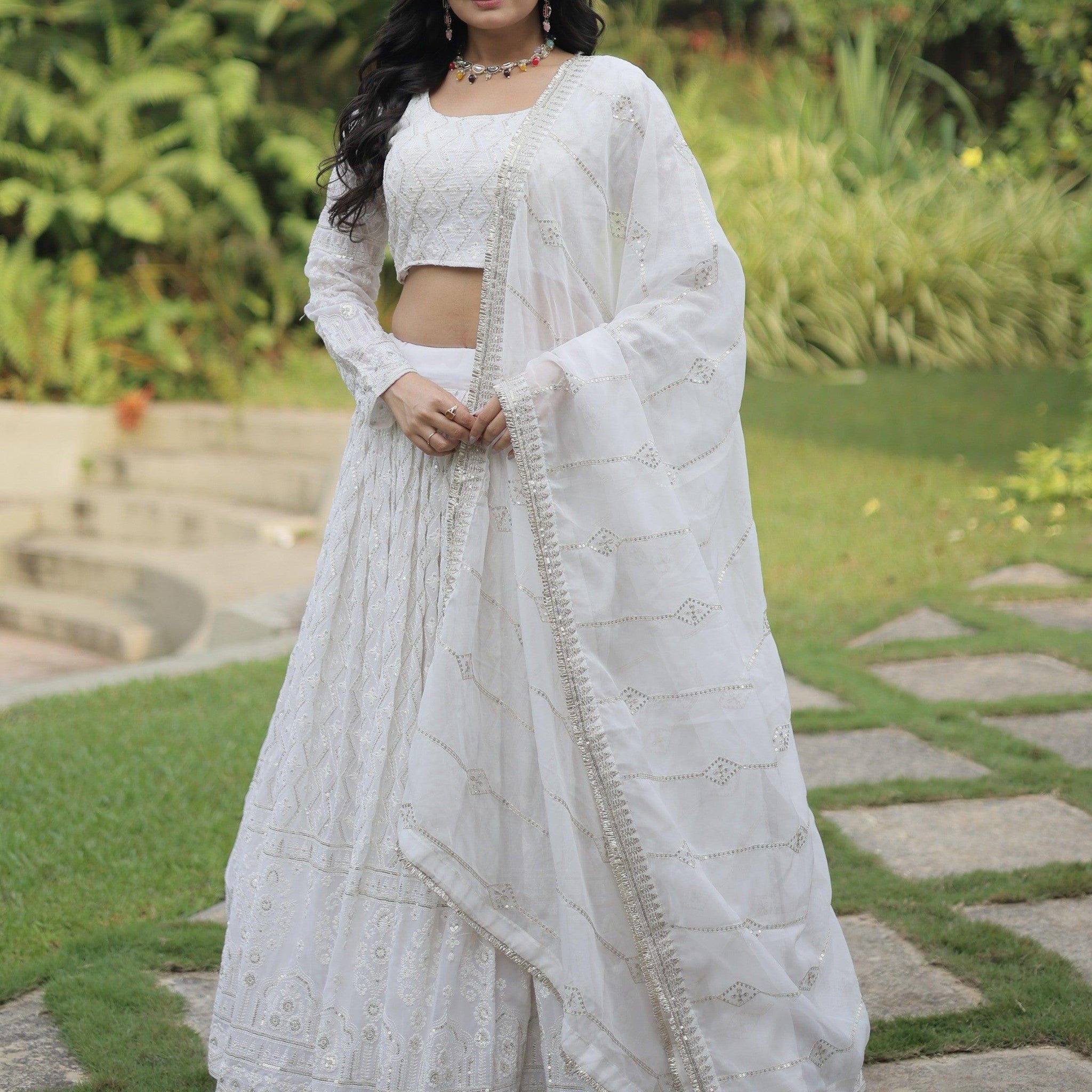 Bewitching White Thread Work Georgette Reception Wear Lehenga Choli