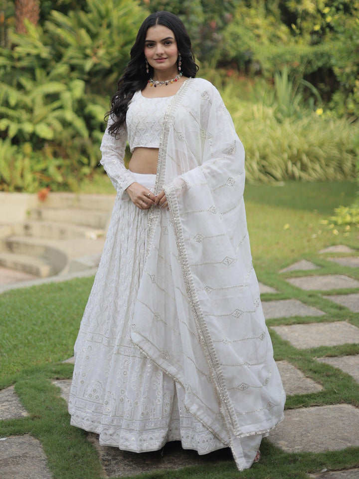 Bewitching White Thread Work Georgette Reception Wear Lehenga Choli