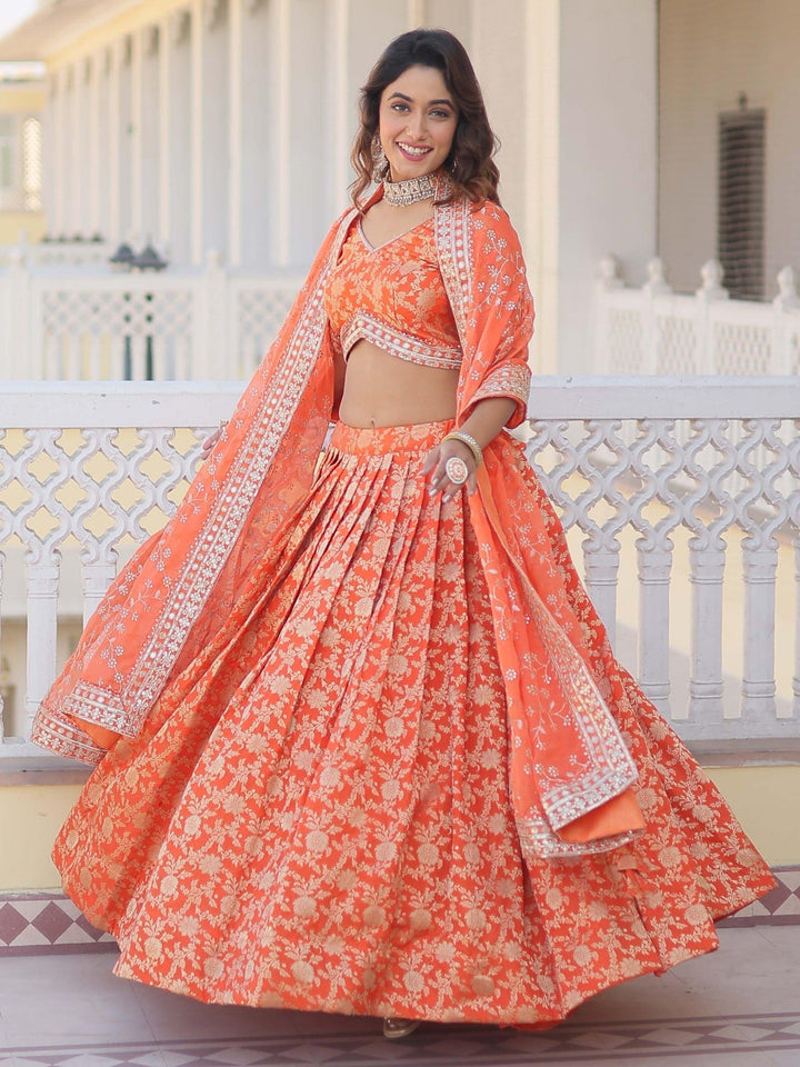 Wonderful Orange Embroidered Jacquard Sangeet Wear Lehenga Choli