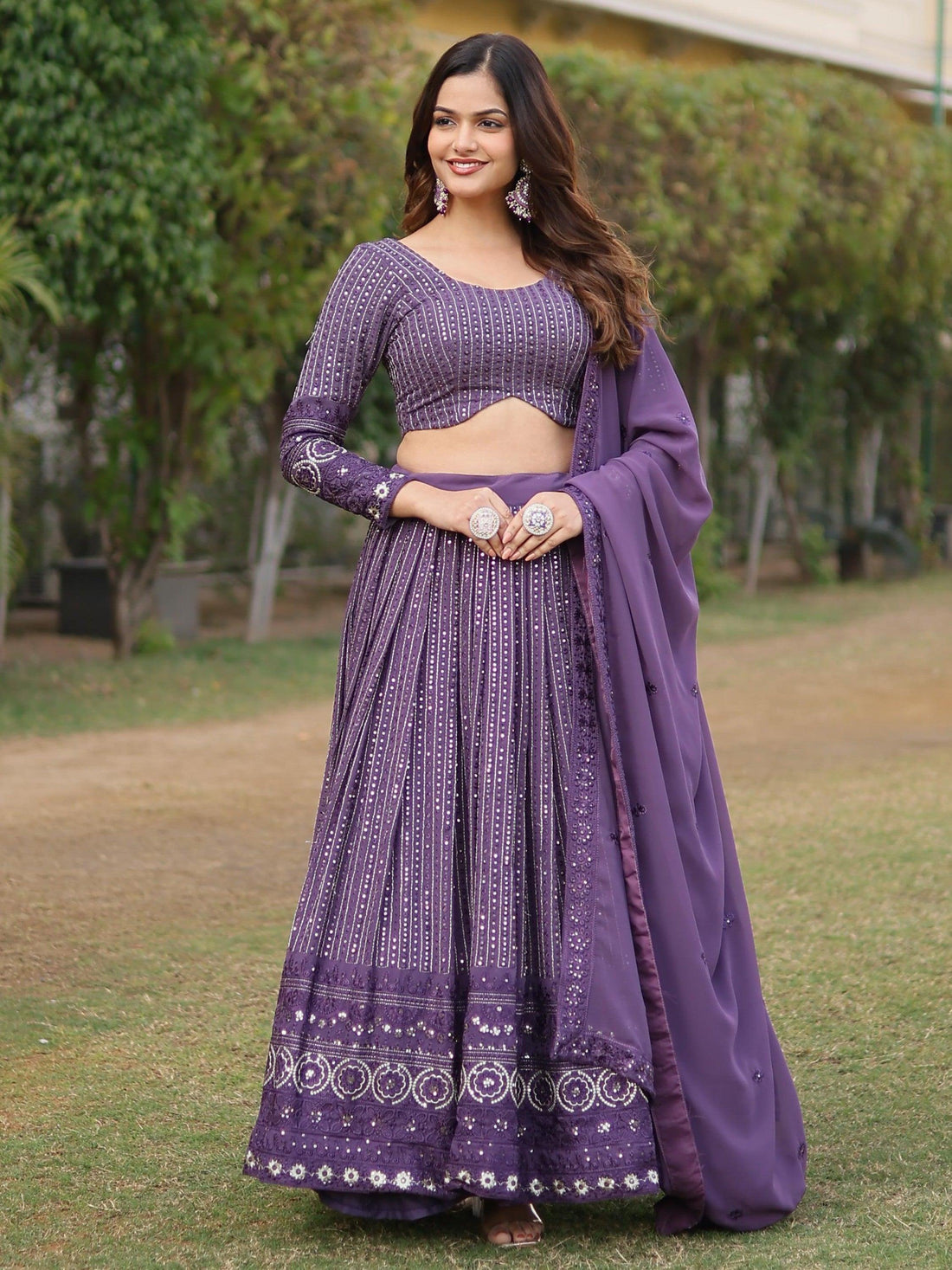 Irresistible Purple Sequins Georgette Wedding Wear Lehenga Choli