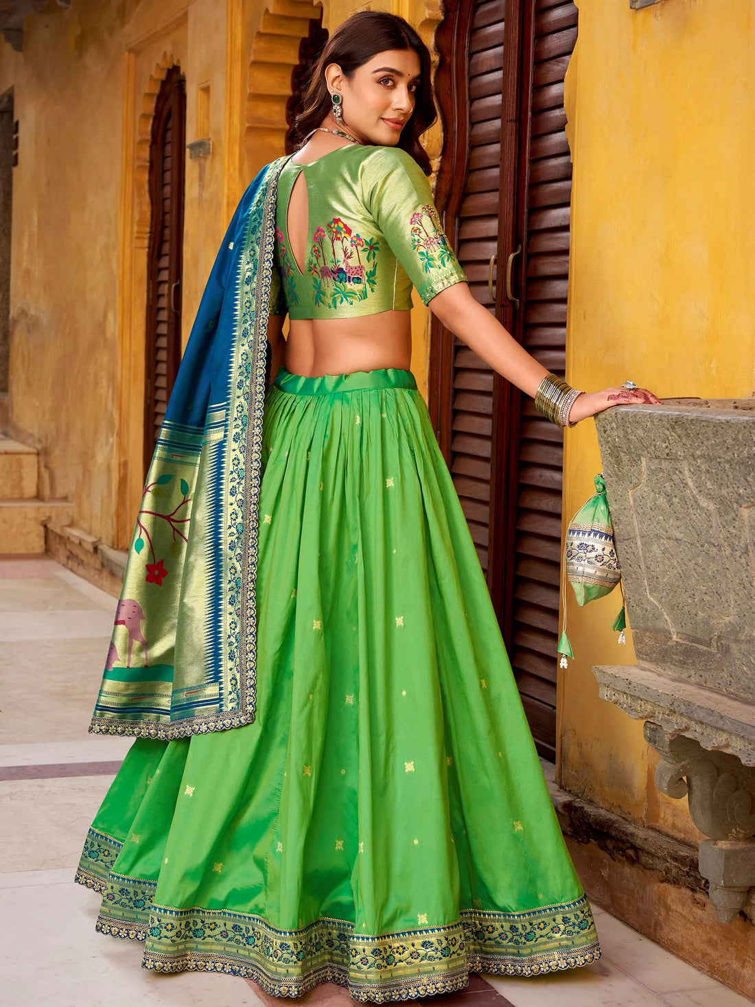 Magnetic Parrot Green Zari Work Silk Evening Wear Lehenga With Dupatta
