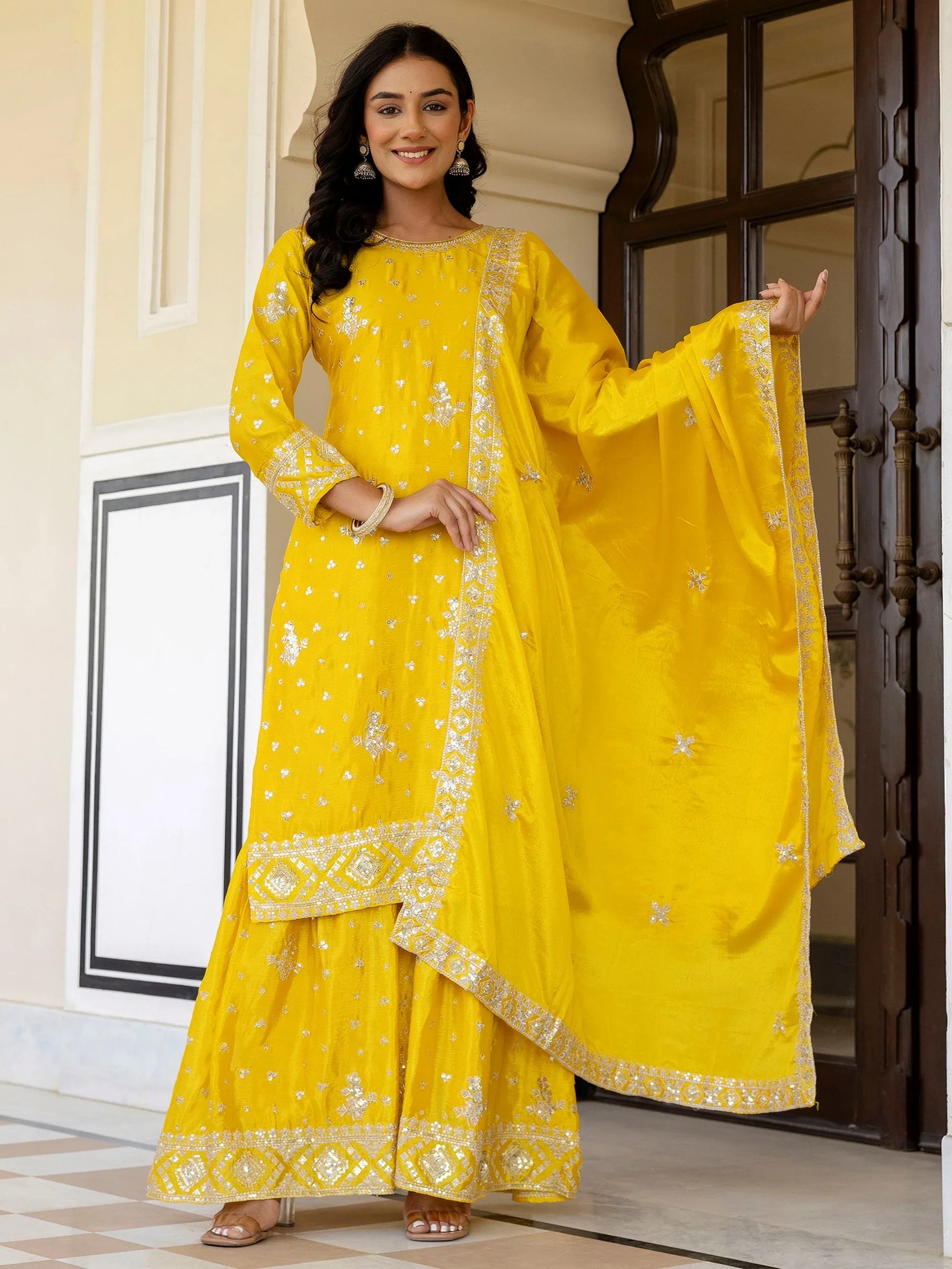 Magnetic Yellow Embroidered Chinon Haldi Wear Gharara Suit With Dupatta
