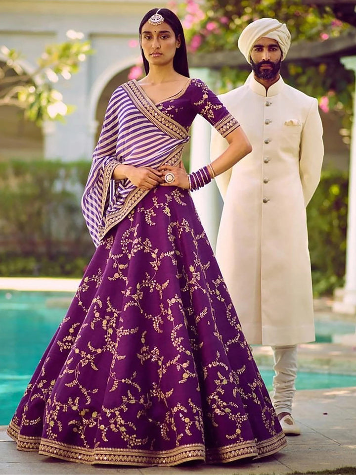Marvellous Purple Color Bridalwear Embroidered Lehenga Choli