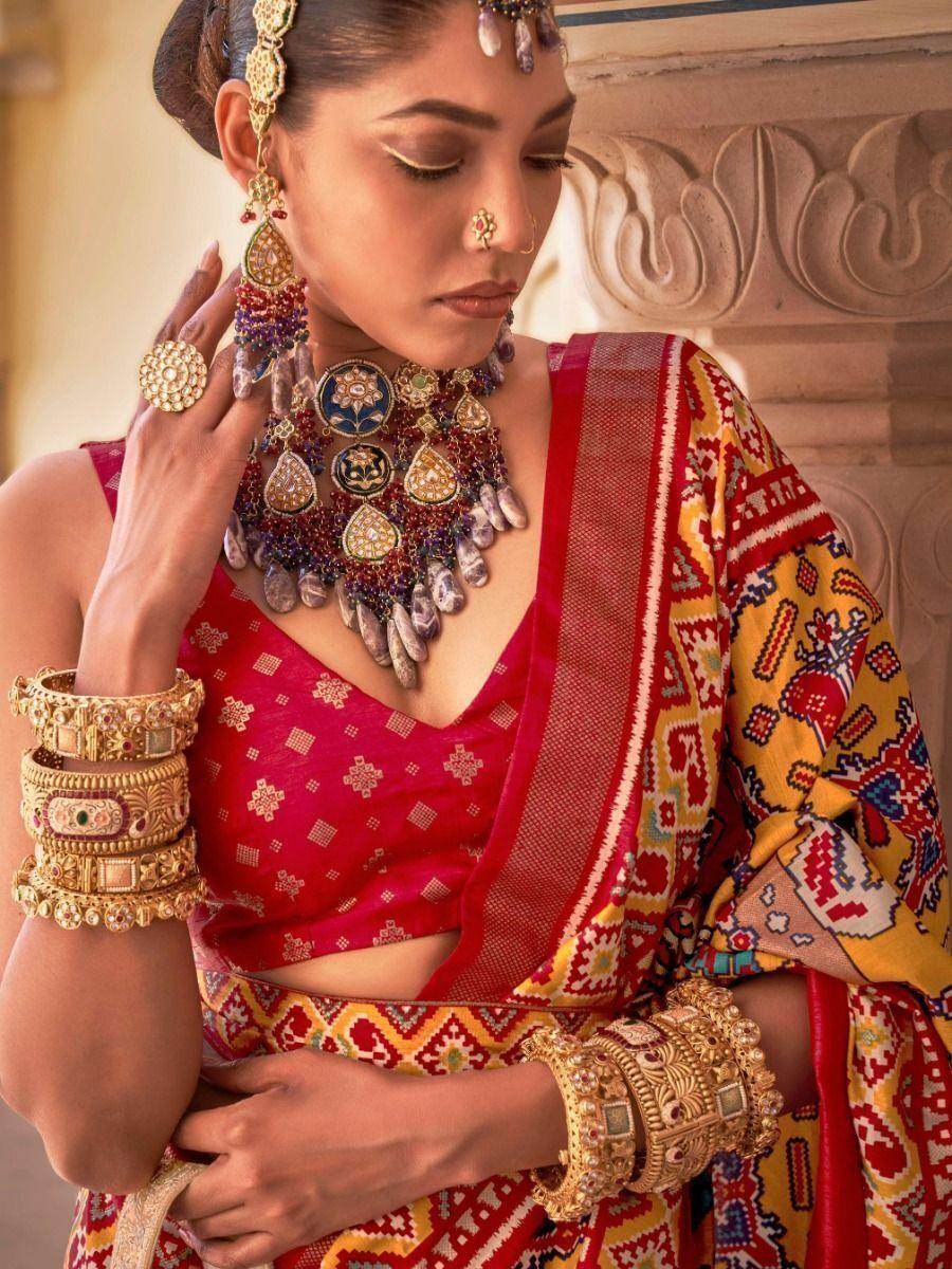 Mesmerizing Mustard Yellow Patola Printed Silk Wedding Saree - Zeel Clothing