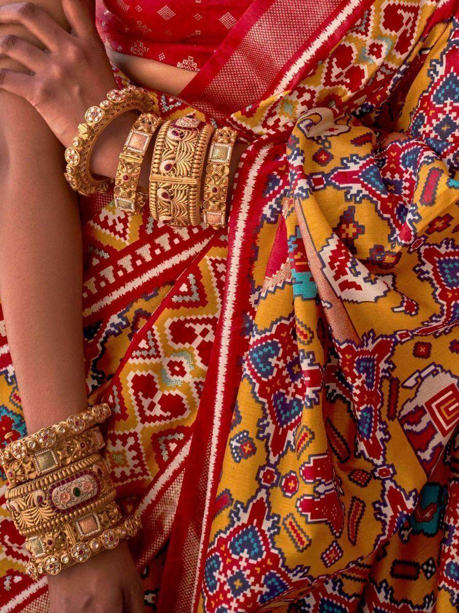 Mesmerizing Mustard Yellow Patola Printed Silk Wedding Saree - Zeel Clothing