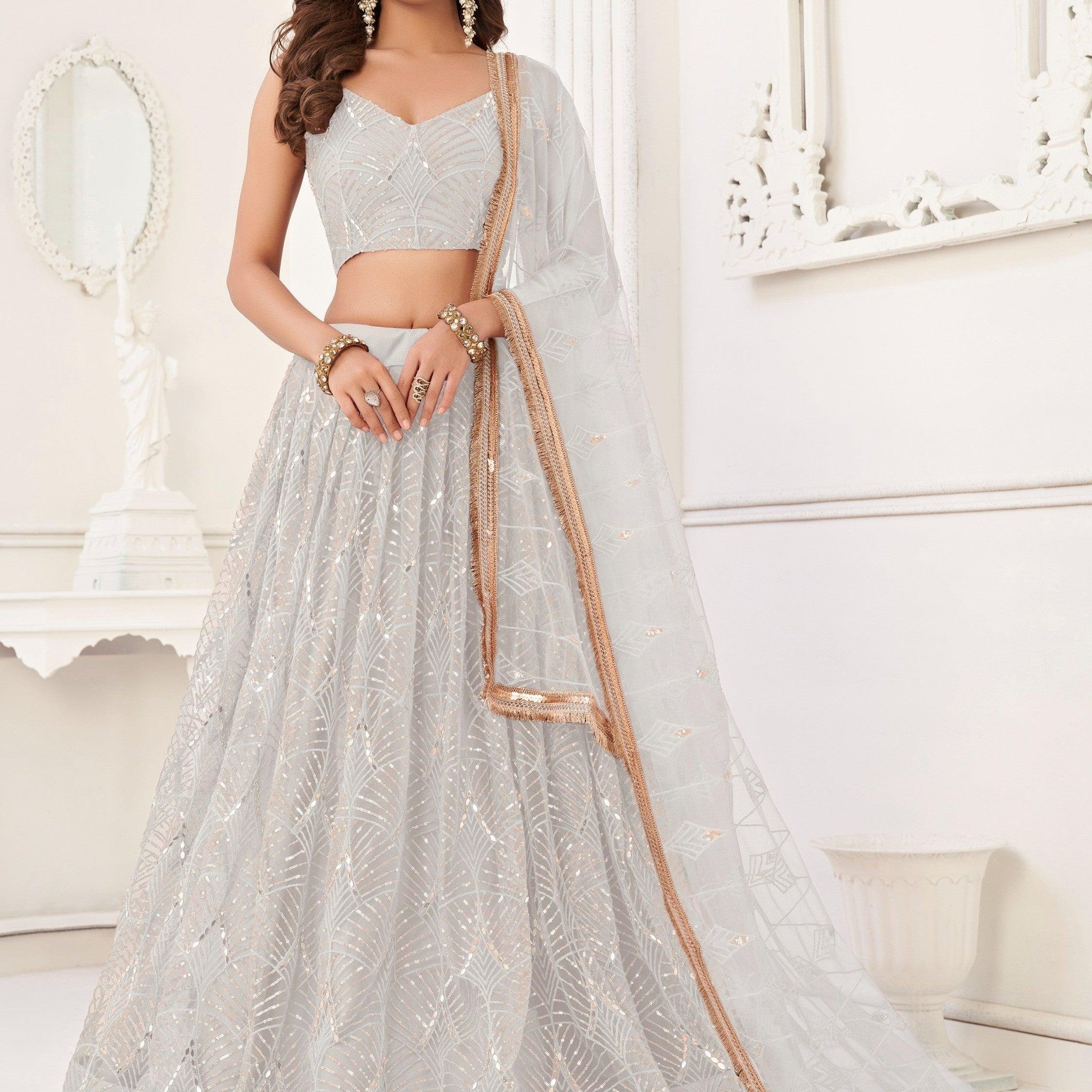 Stunning Off-White Sequins Net Wedding Wear Lehenga Choli With Dupatta