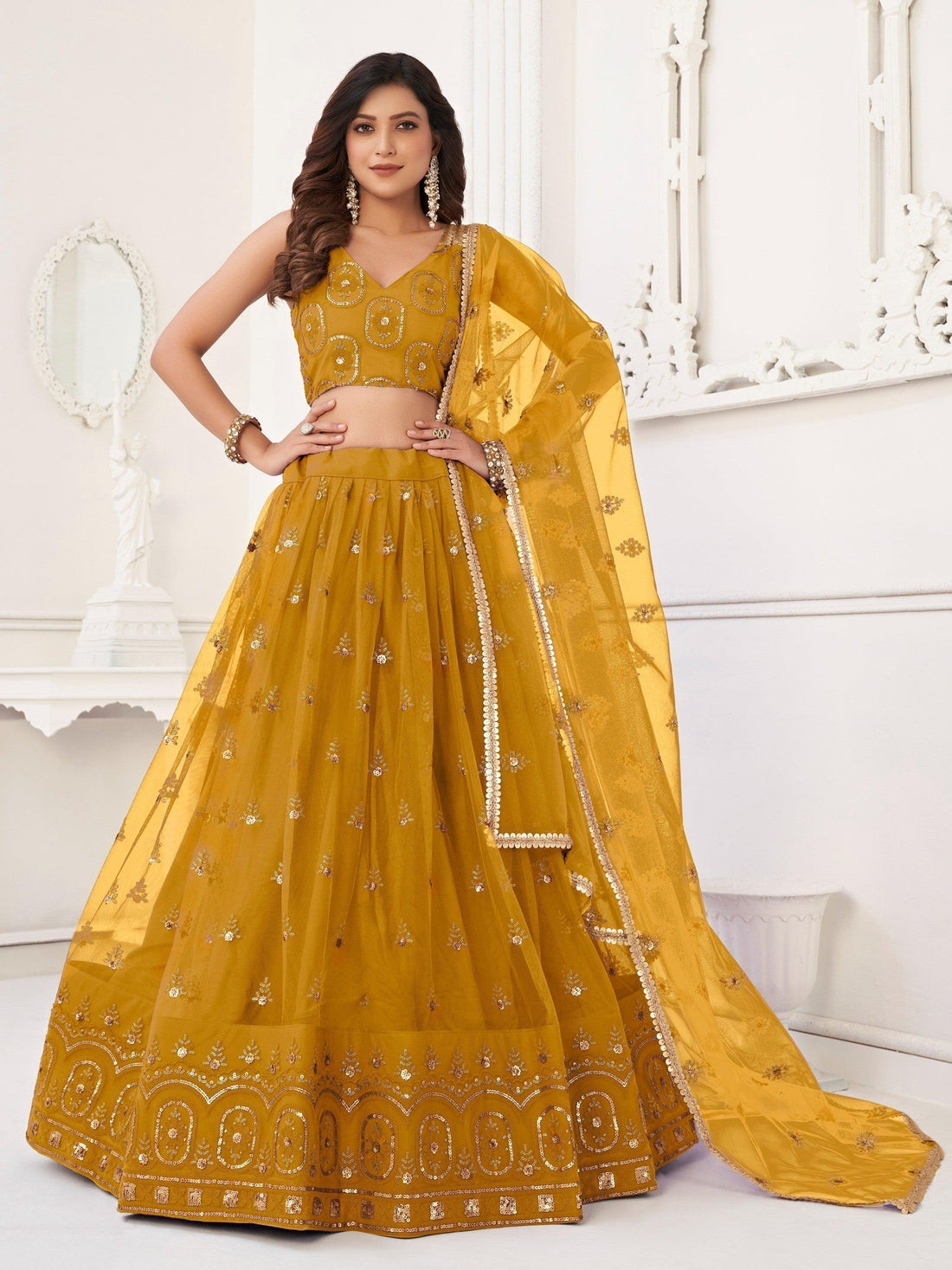 Enchanting Mustard Yellow Sequins Net Haldi Wear Lehenga Choli