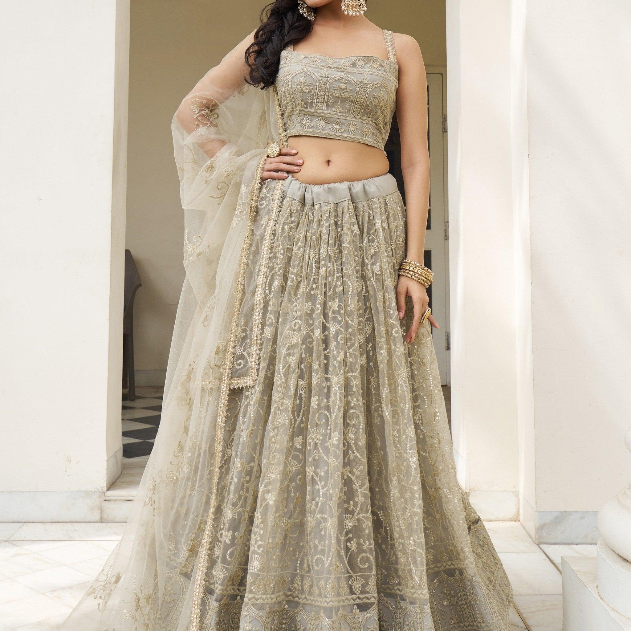 Bewitching Ivory Thread Work Net Engagement Wear Lehenga Choli