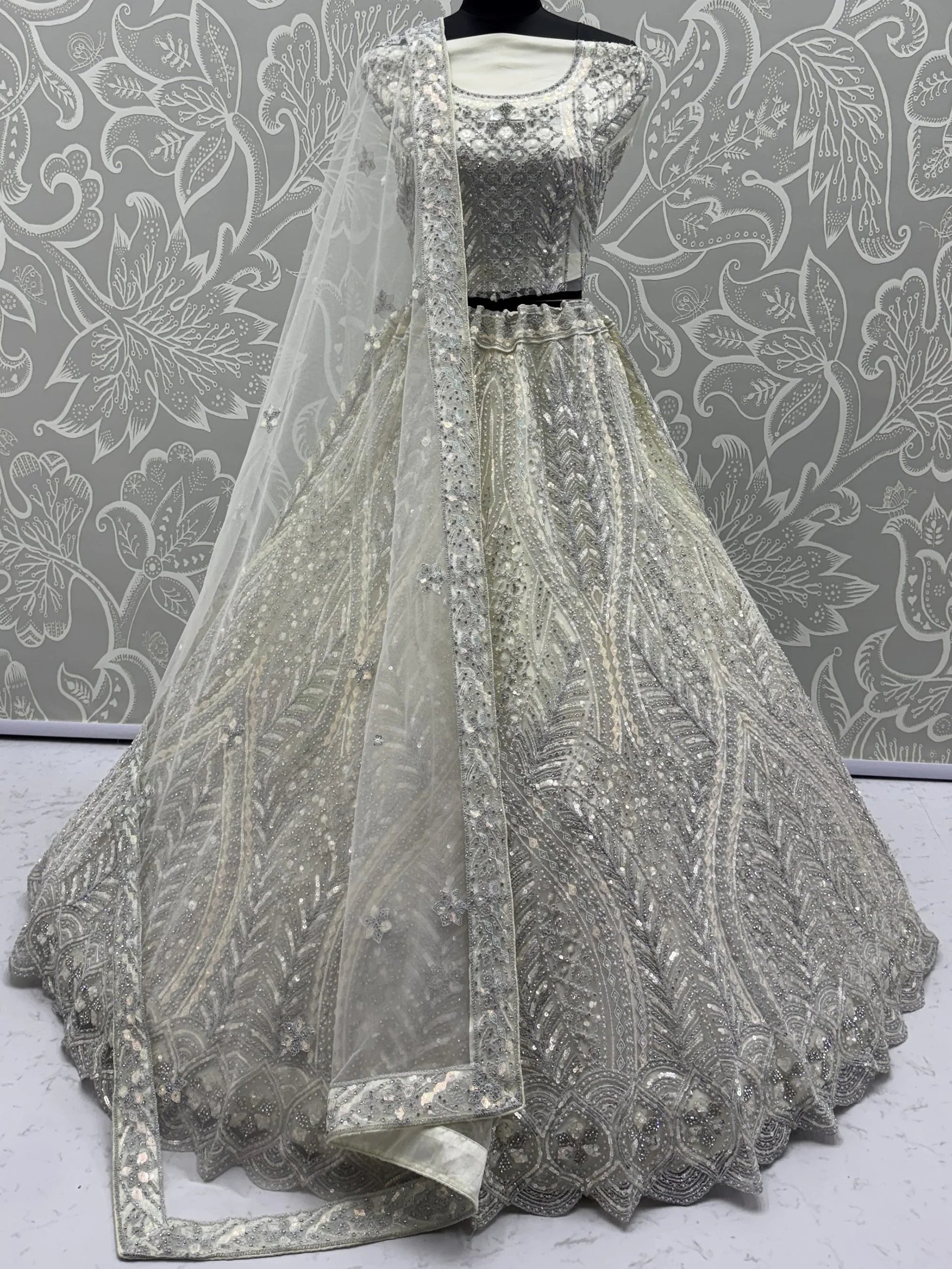 Notable White Embroidered Net Function Wear Lehenga Choli With Dupatta