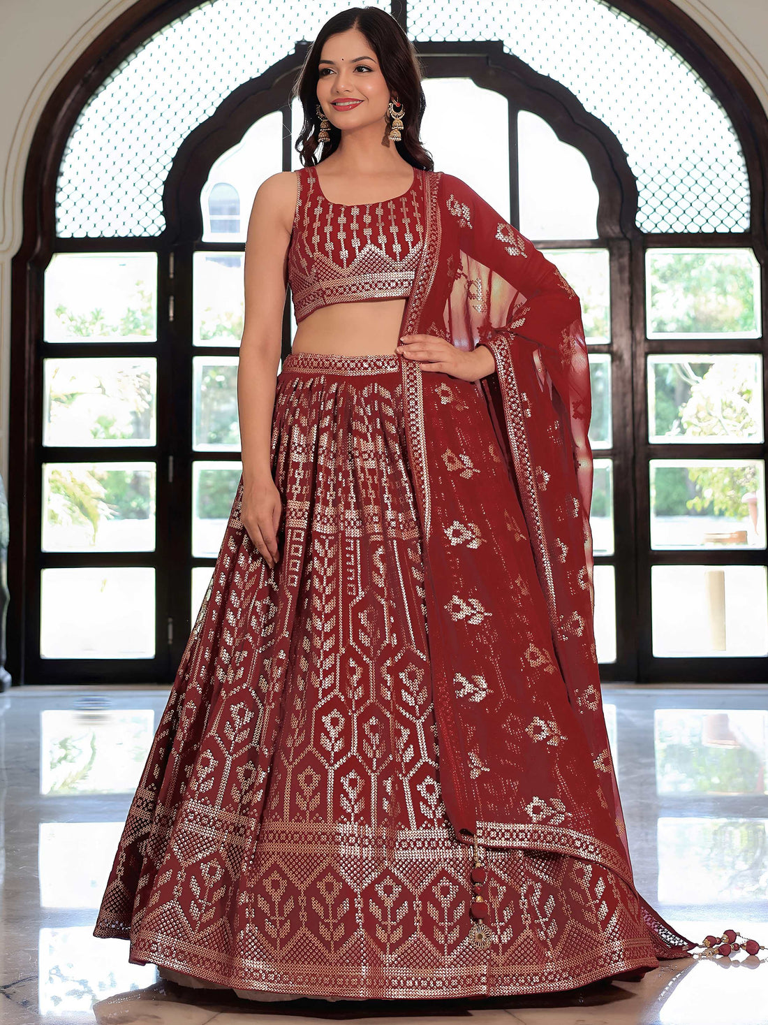 Noteworthy Maroon Sequins Georgette Reception Wear Lehenga Choli