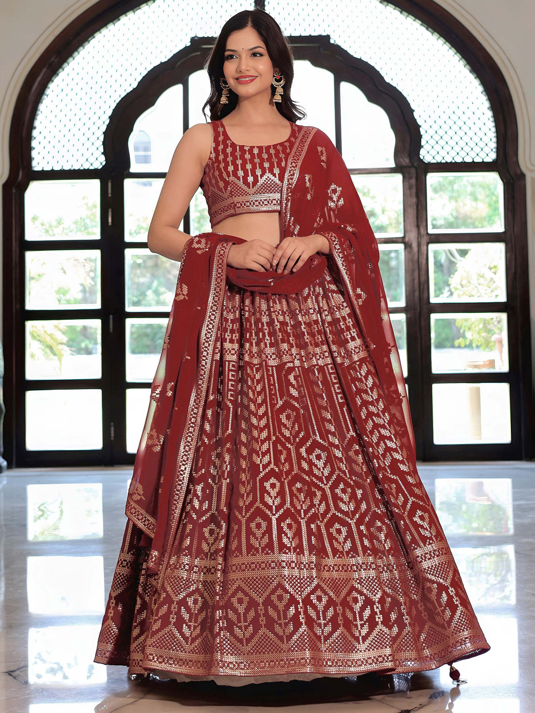 Noteworthy Maroon Sequins Georgette Reception Wear Lehenga Choli
