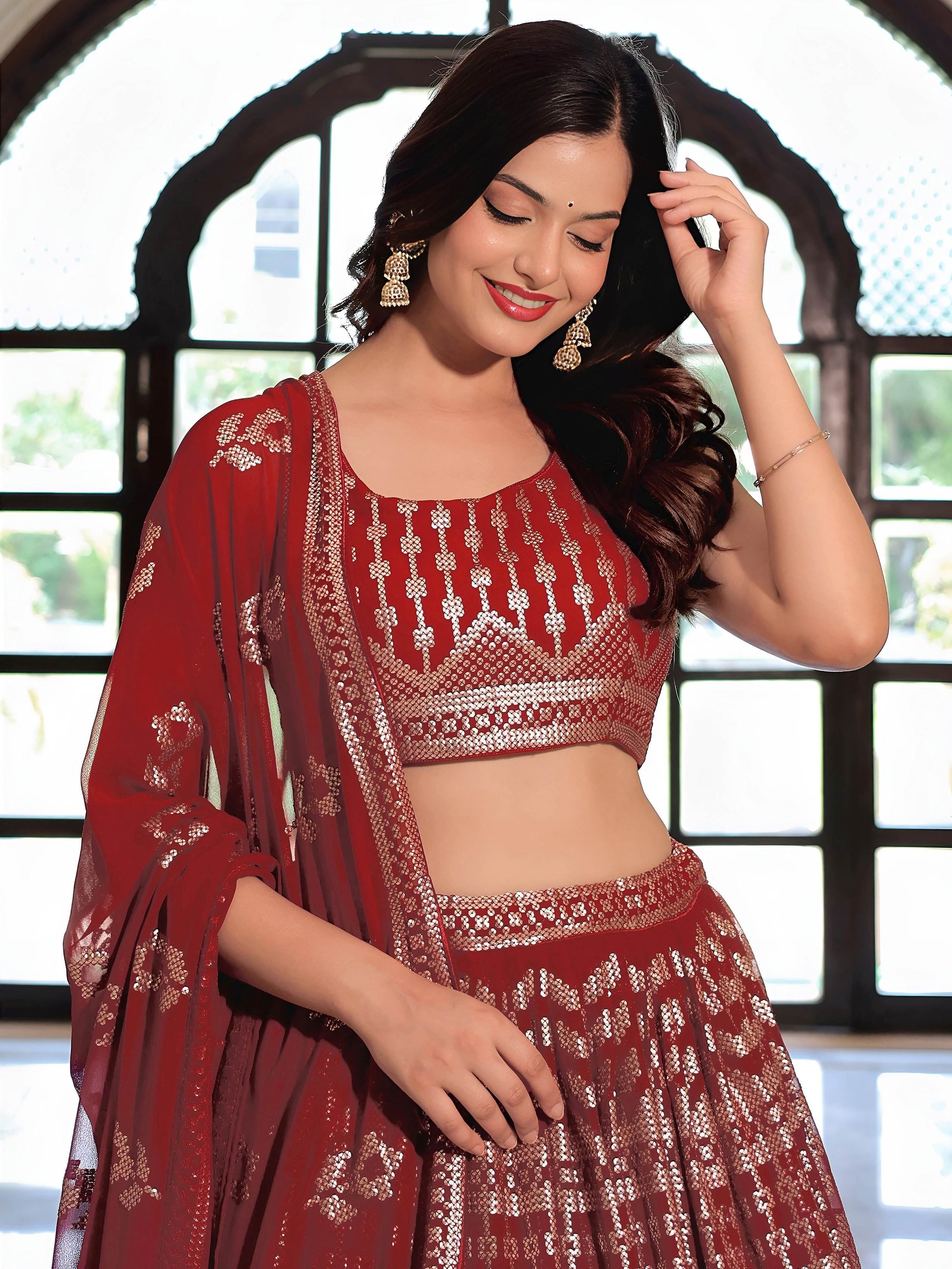 Noteworthy Maroon Sequins Georgette Reception Wear Lehenga Choli