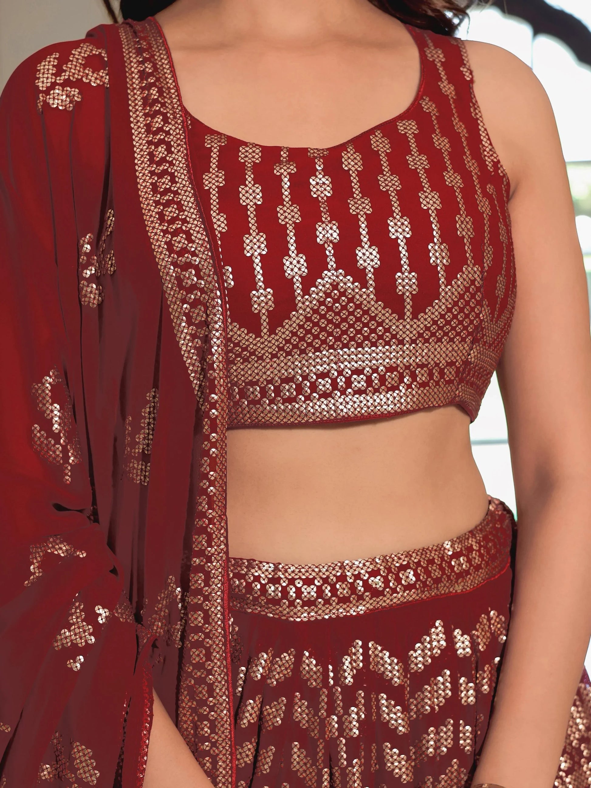 Noteworthy Maroon Sequins Georgette Reception Wear Lehenga Choli