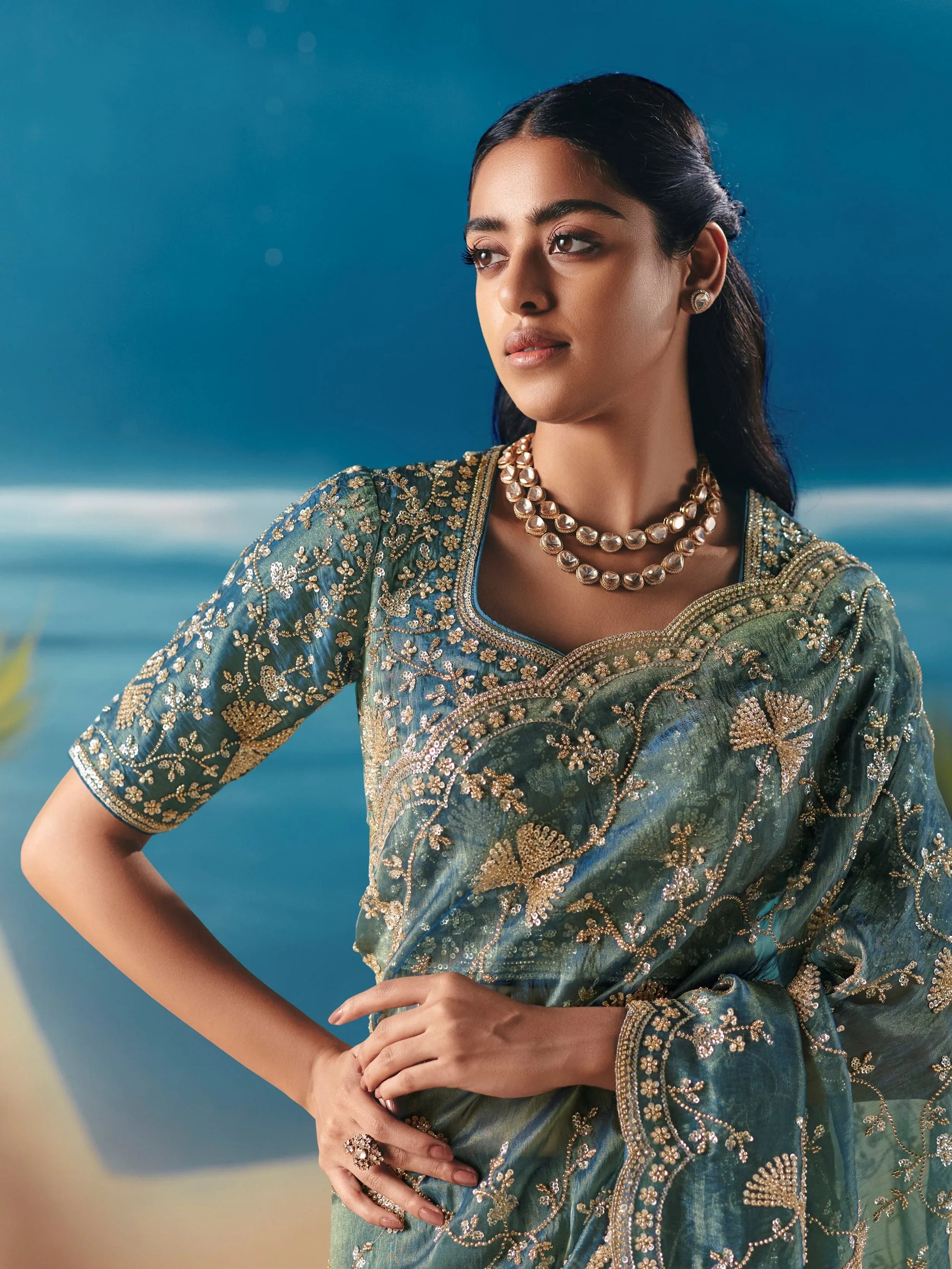 Noteworthy Teal Green Sequins Georgette Party Wear Saree With Blouse