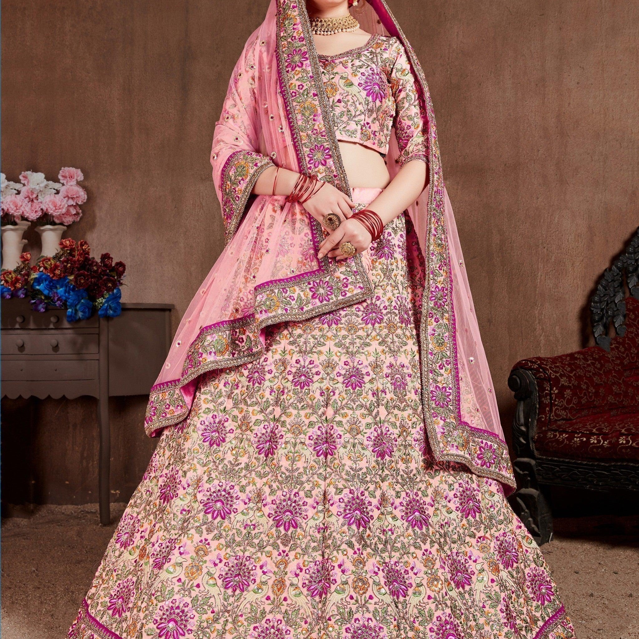 Arresting Pastel Pink Colored Bridal Wear Designer Embroidered Lehenga choli