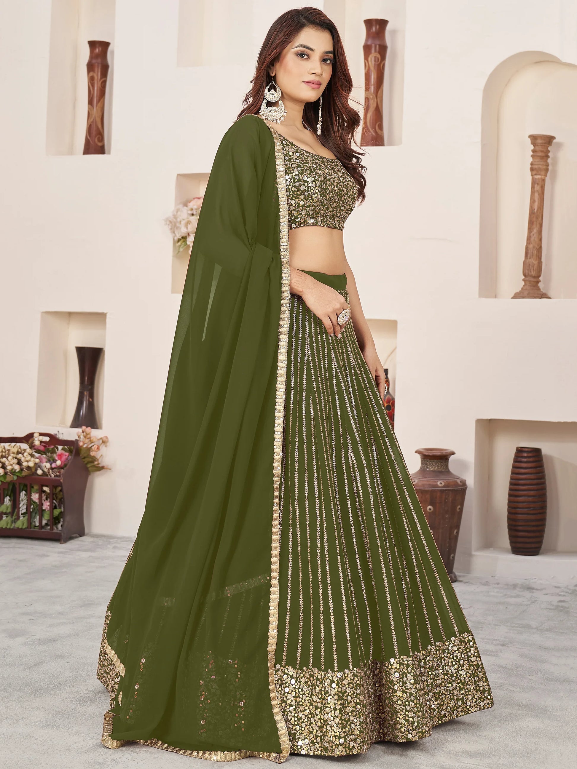 Outstanding Green Sequins Georgette Mehendi Wear Lehenga Choli - Zeel Clothing