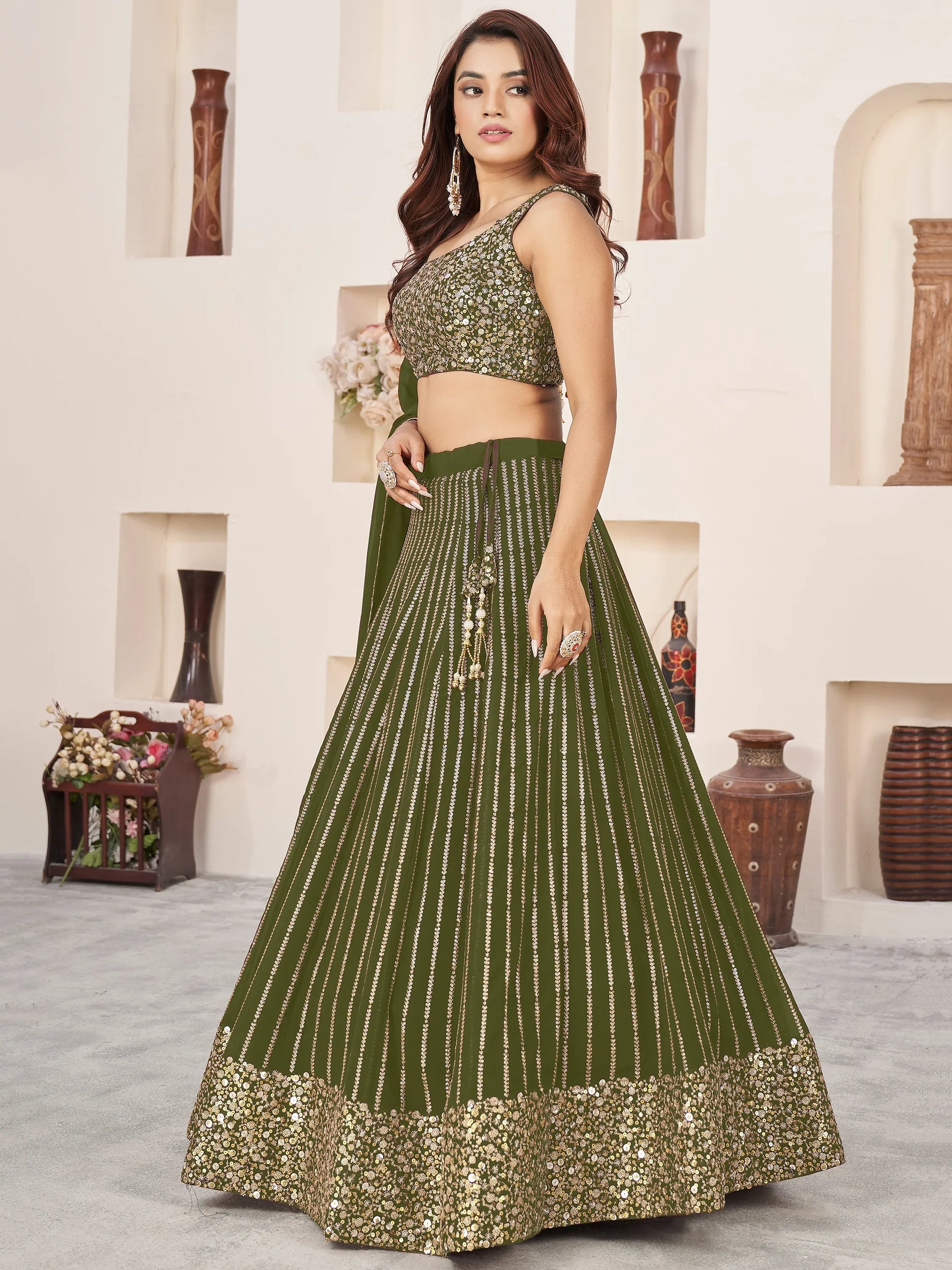 Outstanding Green Sequins Georgette Mehendi Wear Lehenga Choli - Zeel Clothing