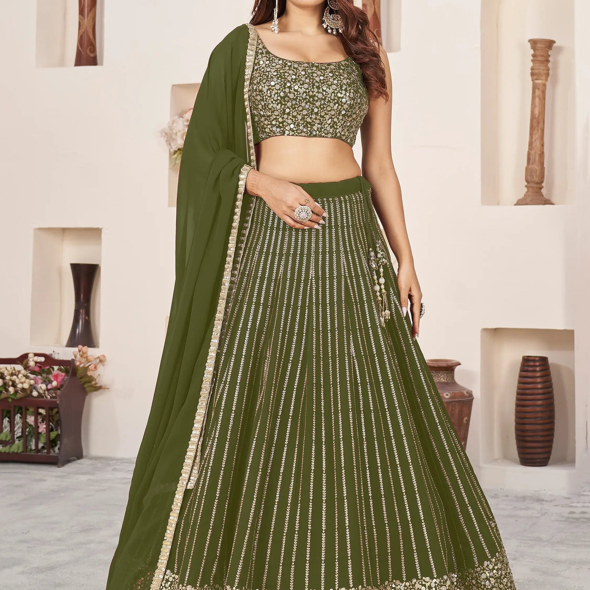 Outstanding Green Sequins Georgette Mehendi Wear Lehenga Choli - Zeel Clothing
