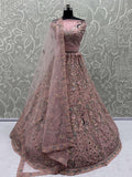 Outstanding Peach Zircon Work Net Bridesmaid Lehenga With Blouse