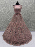 Outstanding Peach Zircon Work Net Bridesmaid Lehenga With Blouse