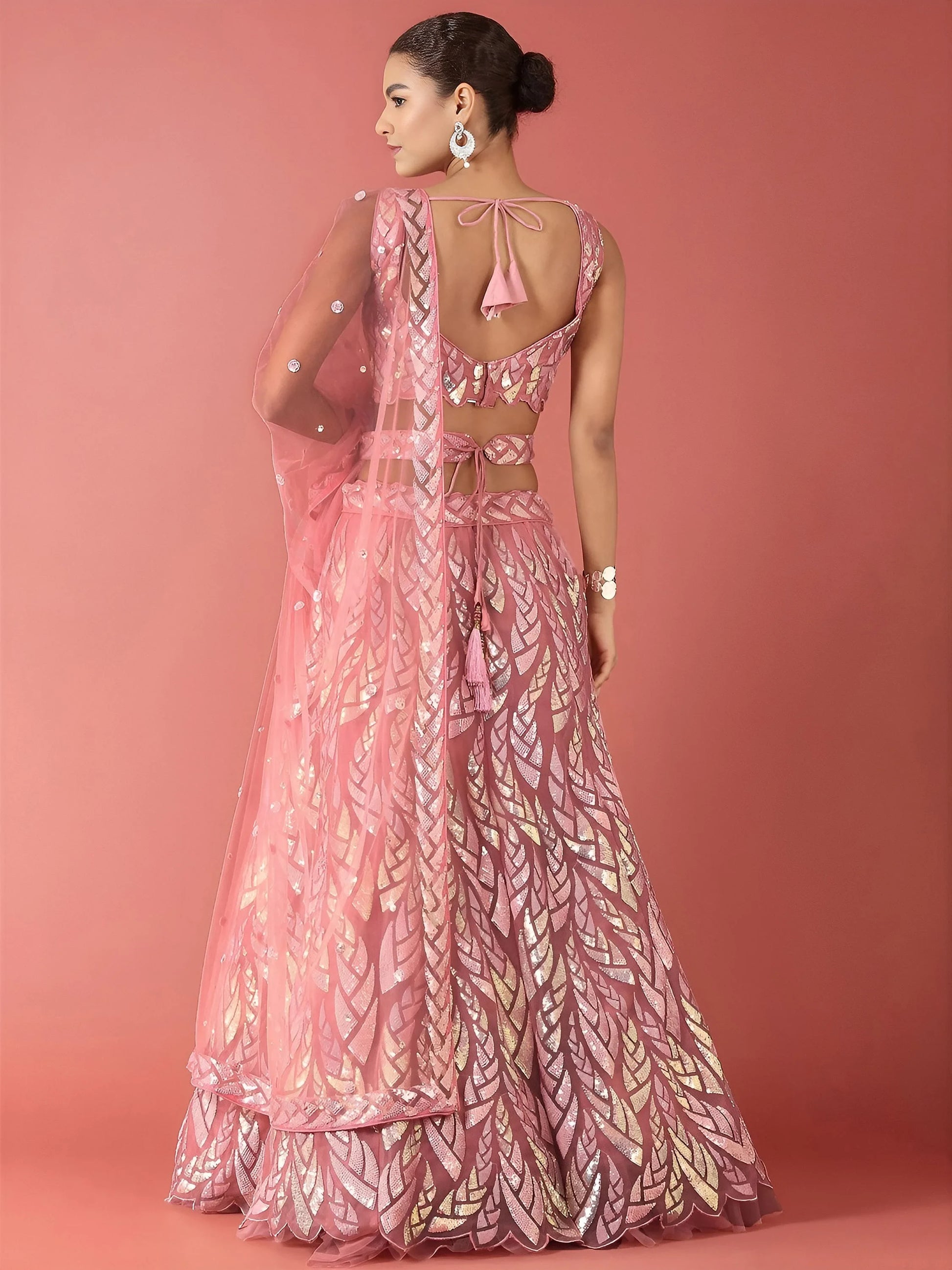 Outstanding Pink Sequins Net Reception Wear Lehenga Choli