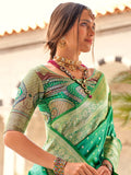 Outstanding Teal Green Zari Weaving Silk Saree With Blouse - Zeel Clothing