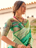 Outstanding Teal Green Zari Weaving Silk Saree With Blouse - Zeel Clothing