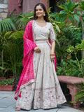 Graceful Off-White Heavy Work Silk Lehenga Choli With Pink Dupatta
