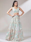 Astonishing Pista Green Sequins Net Wedding Wear Lehenga Choli