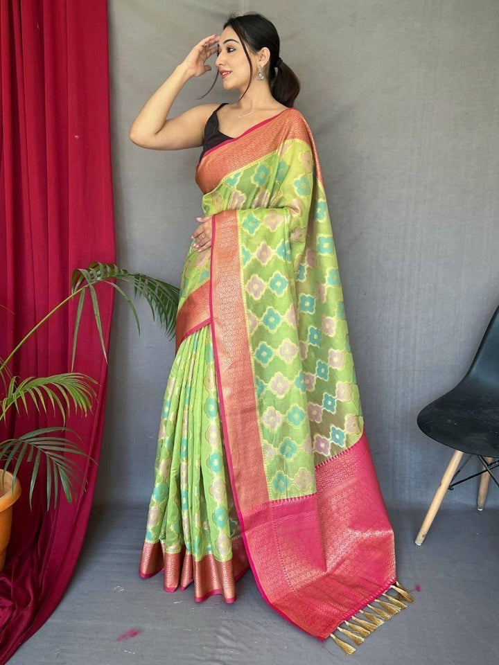 Pleasant Pista Green Woven Tissue Silk Traditional Saree With Blouse
