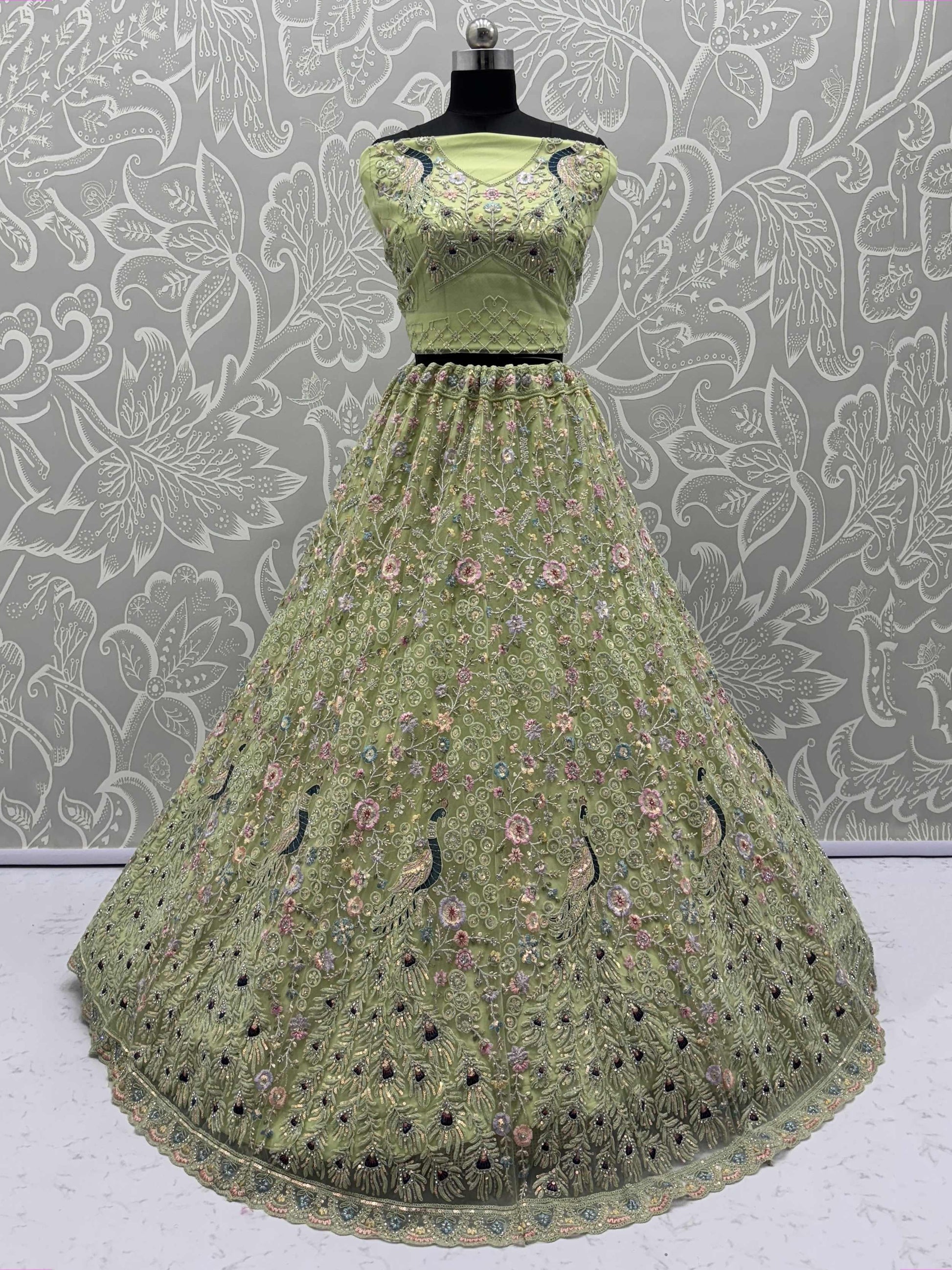 Pretty Green Zircon Work Net Sangeet Wear Lehenga Choli With Dupatta