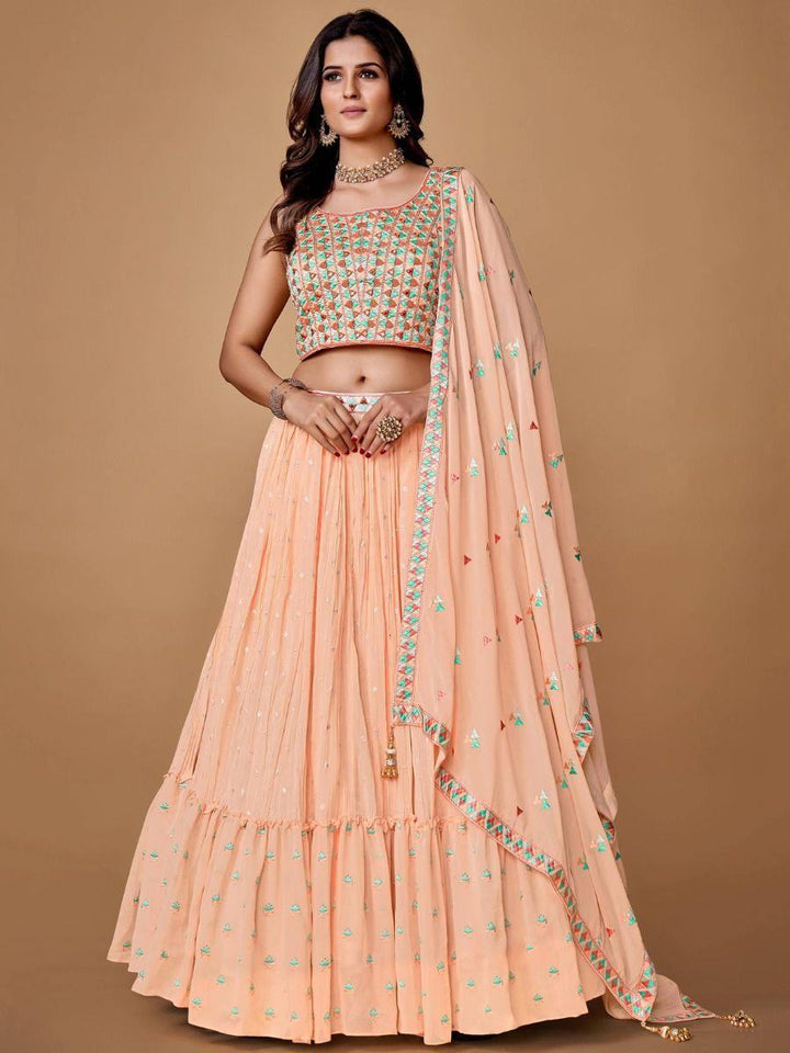 Pretty Peach Embroidered Georgette Reception Wear Lehenga Choli