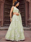 Pretty Pista Green Sequins Embroidery Net Mehendi Wear Lehenga With Blouse