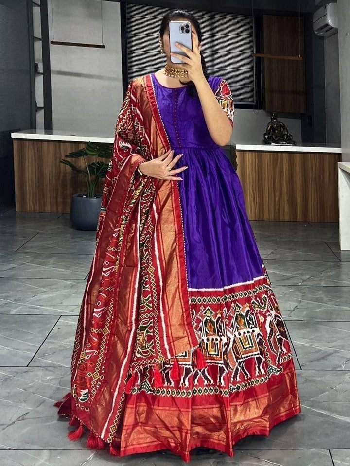 Pretty Purple Patola Printed Silk Festive Wear Gown With Dupatta