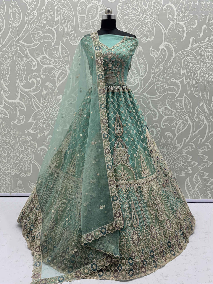 Pretty Sea Green Embroidered Net Function Wear Lehenga Choli With Dupatta