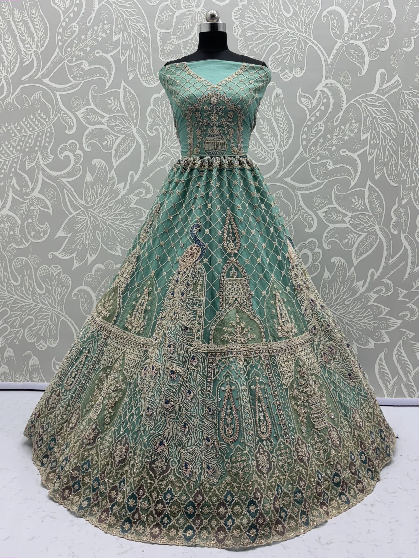 Pretty Sea Green Embroidered Net Function Wear Lehenga Choli With Dupatta