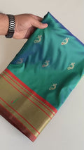 Delicate Teal Green Pichwai Printed Silk Function Wear Saree With Blouse