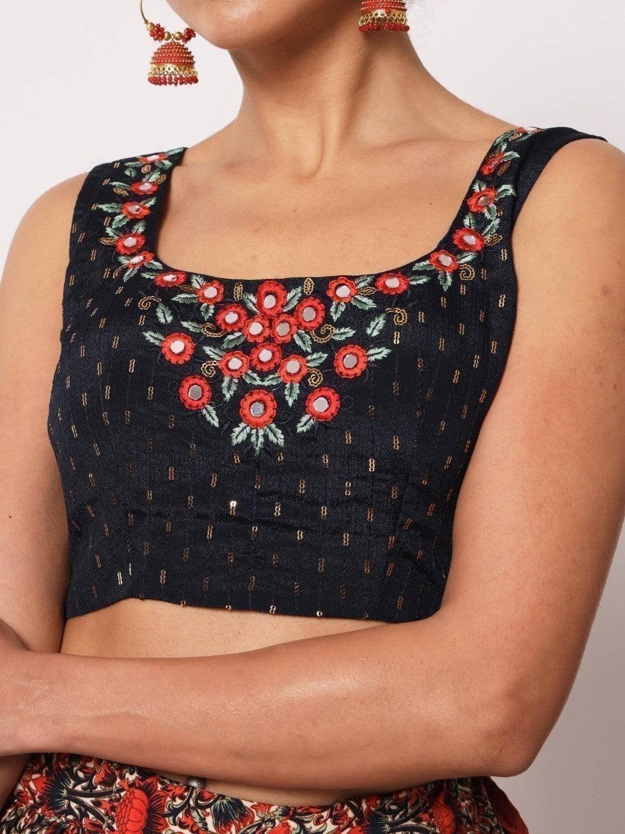 Black embroidered crop top with red floral design, sleeveless square neck, paired with matching earrings