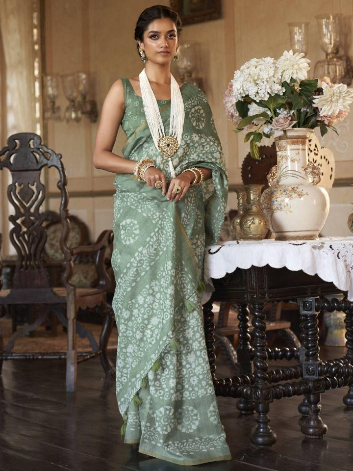 Fascinating Sea Green Floral Printed Cotton Ceremonial Wear Saree