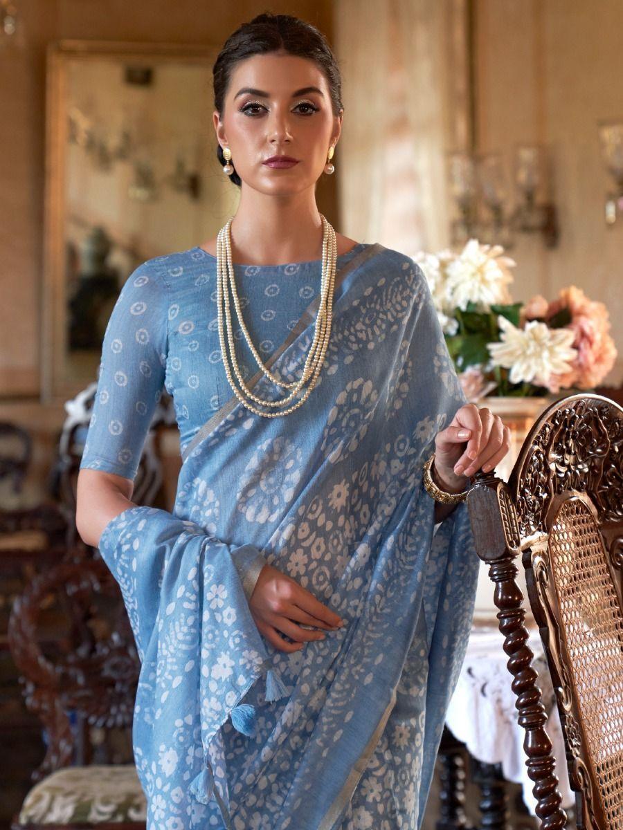 Delightful Aqua Blue Floral Printed Cotton Festival Wear Saree