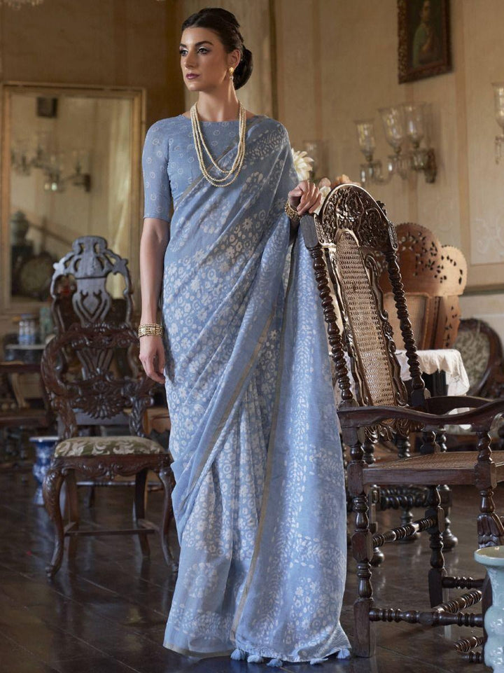 Delightful Aqua Blue Floral Printed Cotton Festival Wear Saree