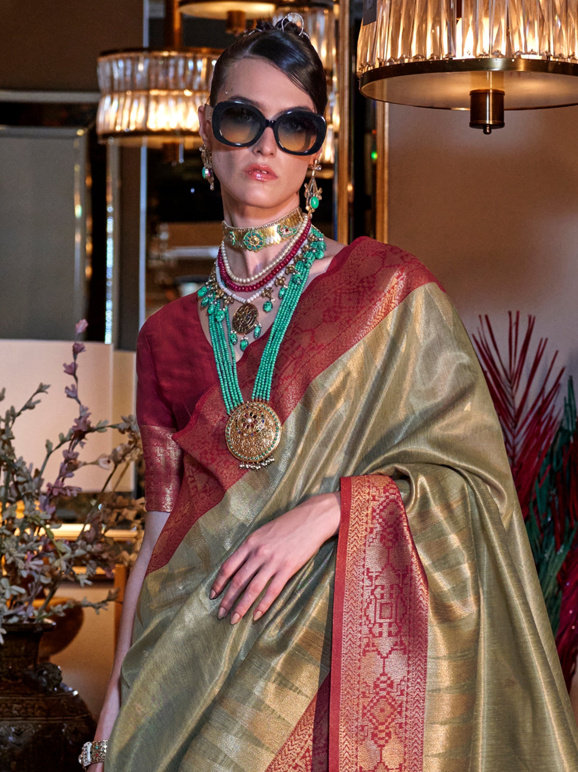 Fabulous Olive Green Zari Weaving Tissue Silk Event Wear Saree