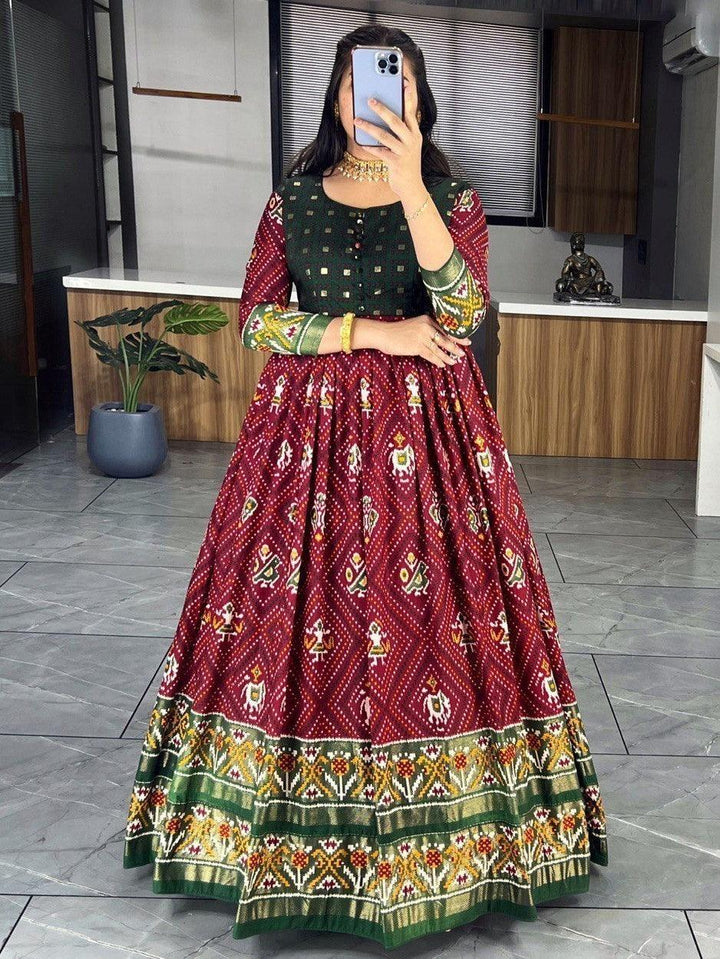 Ravishing Maroon Bandhani Printed Silk Function Wear Gown