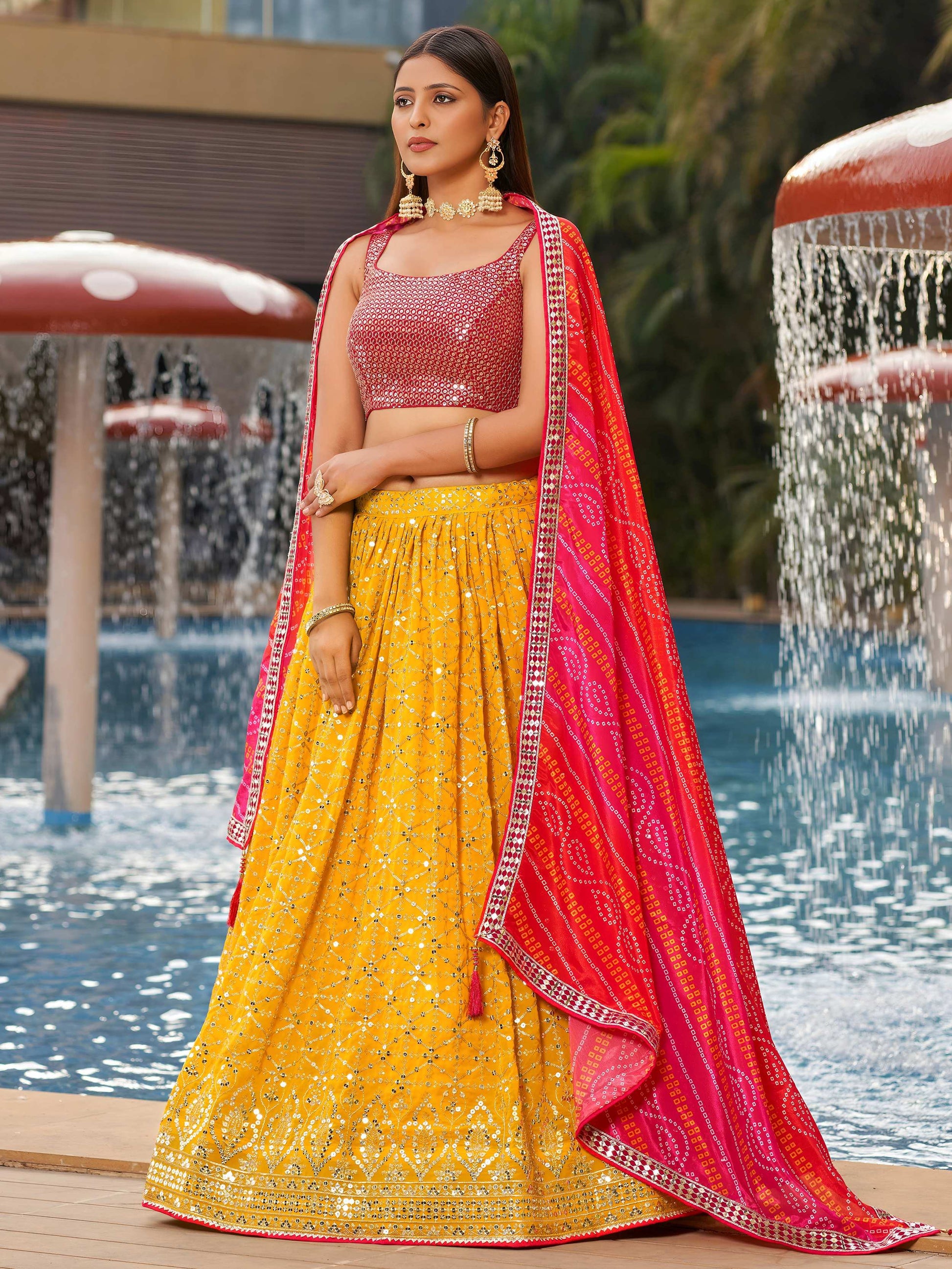 Ravishing Yellow Sequins Georgette Sangeet Wear Lehenga Choli