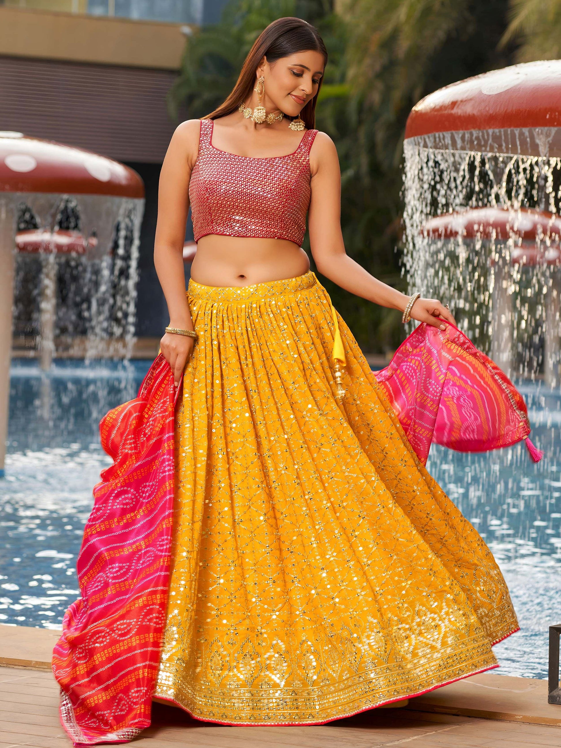 Ravishing Yellow Sequins Georgette Sangeet Wear Lehenga Choli